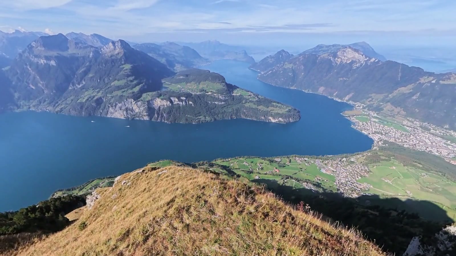 Explorer Alliance film still overlooking an Alpine lake